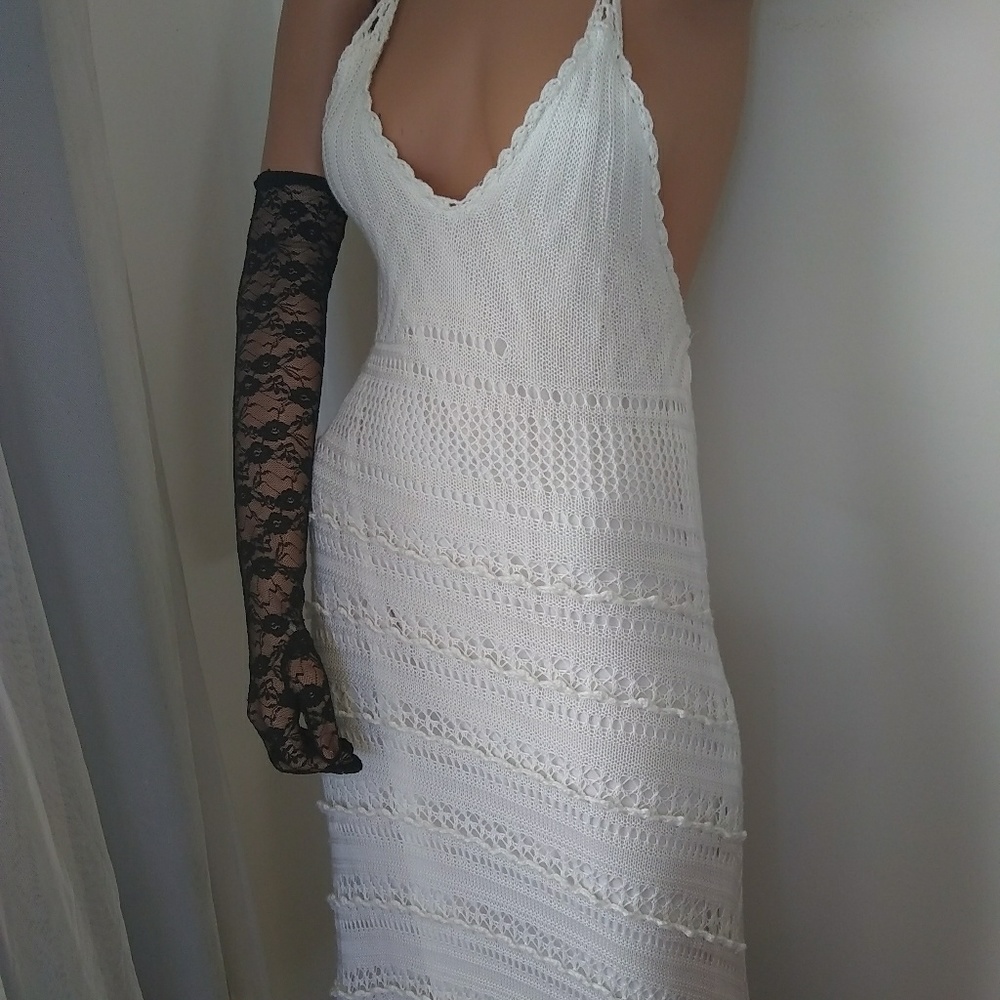 Stunning floor length crotched halter dress in whi